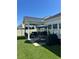 Outdoor entertaining space featuring a large back porch, grill and comfortable seating at 1039 Graybill Lane, North Myrtle Beach, SC 29582