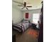 Bright bedroom with a ceiling fan, a large window, and desk at 1039 Graybill Lane, North Myrtle Beach, SC 29582