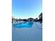 Community pool featuring lounge chairs and a nearby structure with seating at 1039 Graybill Lane, North Myrtle Beach, SC 29582