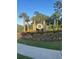 Neighborhood entrance sign with attractive landscaping and flowering plants at 1039 Graybill Lane, North Myrtle Beach, SC 29582