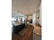 Open concept kitchen features a center island, stainless appliances, and granite countertops at 1039 Graybill Lane, North Myrtle Beach, SC 29582