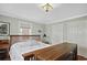 Cozy bedroom featuring hardwood floors, comfortable bed, and bright lighting at 104 East Bay St., Georgetown, SC 29440
