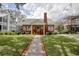 Inviting brick home with well-manicured lawn and a brick walkway leading to the front door at 104 East Bay St., Georgetown, SC 29440