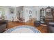 Hallway showcasing hardwood floors, traditional moulding, and seamless transitions between rooms at 104 East Bay St., Georgetown, SC 29440