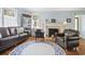 Comfortable living room with a fireplace, hardwood floors, and tasteful decor, creating a warm ambiance at 104 East Bay St., Georgetown, SC 29440