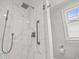 Modern shower with sleek fixtures, and tiled walls at 104 East Bay St., Georgetown, SC 29440