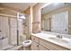Clean bathroom features a walk-in shower, vanity with sink, and a large mirror at 109 Butkus Dr. # 2-1, Myrtle Beach, SC 29588