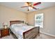 Cozy bedroom boasts a window for natural light and comfortable carpet flooring at 109 Butkus Dr. # 2-1, Myrtle Beach, SC 29588