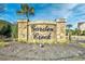 Elegant stone sign displaying 'Garden Creek' amidst lush landscaping welcomes visitors at 109 Butkus Dr. # 2-1, Myrtle Beach, SC 29588
