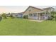 Expansive backyard featuring a well-maintained lawn with view of covered porch at 1227 Cypress Shadow Ct., Murrells Inlet, SC 29576