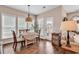 This sunlit dining room has access to the outdoor patio at 1227 Cypress Shadow Ct., Murrells Inlet, SC 29576