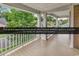 Upper level front porch offering a fantastic space to enjoy the SC weather and scenery at 1227 Cypress Shadow Ct., Murrells Inlet, SC 29576