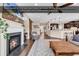 The living room has a modern fireplace and flows seamlessly into the kitchen and dining area at 1227 Cypress Shadow Ct., Murrells Inlet, SC 29576