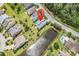 Aerial view of the property highlighting its proximity to a pond and lush landscaping at 126 Dreamland Dr., Murrells Inlet, SC 29576