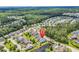 An aerial view of the neighborhood showcasing the lush landscaping, ponds, and community layout at 126 Dreamland Dr., Murrells Inlet, SC 29576