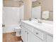 Bathroom features shower-tub combo, tile floors, and a white vanity at 126 Dreamland Dr., Murrells Inlet, SC 29576