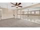 Large bonus room features neutral paint, carpeted floors, and a ceiling fan at 126 Dreamland Dr., Murrells Inlet, SC 29576