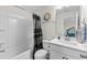 Cozy bathroom featuring a shower and bathtub combination, white vanity, and neutral wall color at 1331 Winding Creek Way, Myrtle Beach, SC 29588