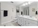 Bright bathroom with double vanity, large mirror, and a shower/tub combination at 1331 Winding Creek Way, Myrtle Beach, SC 29588