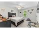 Well-lit bedroom with a ceiling fan and natural light at 1331 Winding Creek Way, Myrtle Beach, SC 29588