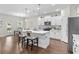 Inviting kitchen with a center island, bar stool seating, and stainless steel appliances at 1331 Winding Creek Way, Myrtle Beach, SC 29588
