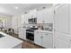 Modern kitchen with white cabinets, stainless steel appliances, and a gas range at 1331 Winding Creek Way, Myrtle Beach, SC 29588
