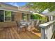 Outdoor deck featuring table, chairs, and an umbrella at 168 Mackinley Circle, Pawleys Island, SC 29585