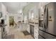 Bright kitchen with stainless appliances, tile backsplash, and eat-in dining at 168 Mackinley Circle, Pawleys Island, SC 29585