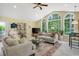 Comfortable living room featuring natural light from the many arched windows at 168 Mackinley Circle, Pawleys Island, SC 29585