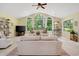Inviting living room with large windows, neutral decor, and a cozy atmosphere at 168 Mackinley Circle, Pawleys Island, SC 29585