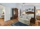 Spacious main bedroom featuring a large wardrobe, and wood flooring at 168 Mackinley Circle, Pawleys Island, SC 29585