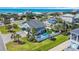 An aerial view of the property showcasing the pool and well manicured lawn at 1705 N Ocean Blvd. N, North Myrtle Beach, SC 29582