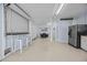 Spacious, finished basement with a dining area, bar, and stainless steel refrigerator at 1705 N Ocean Blvd. N, North Myrtle Beach, SC 29582