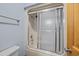 Bathroom with a combination tub and shower featuring sliding doors, plus a toilet at 1705 N Ocean Blvd. N, North Myrtle Beach, SC 29582
