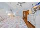 This is a bright bedroom, featuring 2 beds and a white dresser with a TV at 1705 N Ocean Blvd. N, North Myrtle Beach, SC 29582