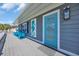 Inviting deck featuring blue rocking chairs and a seahorse decoration offering a relaxing outdoor space at 1705 N Ocean Blvd. N, North Myrtle Beach, SC 29582