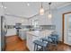 Well-equipped kitchen featuring a center island, bar seating, and ample counter space, perfect for entertaining at 1705 N Ocean Blvd. N, North Myrtle Beach, SC 29582