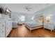 Relaxing primary bedroom features a queen size bed, wood floors, and a bright decor at 1705 N Ocean Blvd. N, North Myrtle Beach, SC 29582