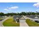 Aerial view of a neighborhood with well-maintained homes and lush green lawns at 177 Baylee Circle, Galivants Ferry, SC 29544