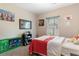 Bedroom with large window, carpet, and paintings on the wall at 177 Baylee Circle, Galivants Ferry, SC 29544