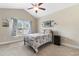 Bright bedroom with vaulted ceiling, ceiling fan, and a large window for natural light at 177 Baylee Circle, Galivants Ferry, SC 29544