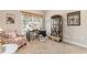 Home office space with natural light from a large window and a comfortable seating area at 177 Baylee Circle, Galivants Ferry, SC 29544
