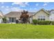 Spacious backyard with a patio, grill, and green grass perfect for entertaining at 1776 Starbridge Dr., Surfside Beach, SC 29575