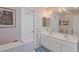 Bathroom featuring double sinks, good lighting, and a separate door for added privacy at 1776 Starbridge Dr., Surfside Beach, SC 29575