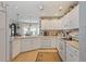 Bright kitchen with white cabinetry, modern appliances, and an eat-in area at 1776 Starbridge Dr., Surfside Beach, SC 29575