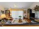 Cozy living room with hardwood floors, a ceiling fan, and comfortable seating area at 1776 Starbridge Dr., Surfside Beach, SC 29575