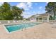Community swimming pool with sun loungers and a covered area surrounded by well-maintained grounds at 1776 Starbridge Dr., Surfside Beach, SC 29575