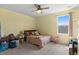 Bedroom with neutral carpet, window views, and furnishings at 196 Cypress Tree Loop, Longs, SC 29568