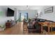 Cozy living area with plush seating, chic decor, and sliding glass doors leading to outdoor space at 196 Cypress Tree Loop, Longs, SC 29568