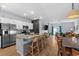 Expansive open floorplan showcasing a seamless flow between the kitchen, dining area, and living space at 196 Cypress Tree Loop, Longs, SC 29568